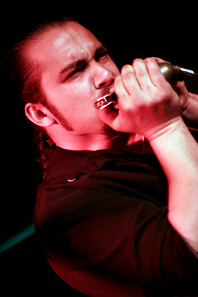 Stevie B playing the mouth organ